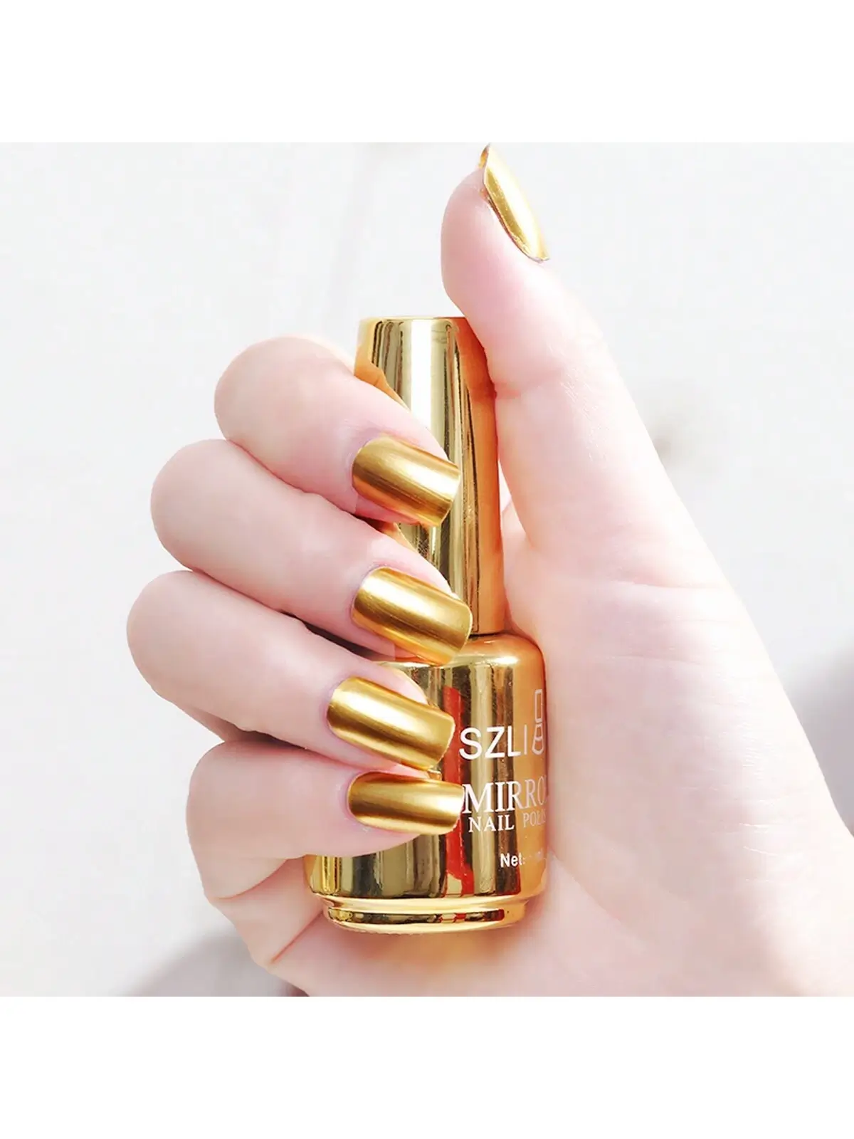16990804094e5507bcd5ac798999ea14fb7acd43cc_square (1) Mirror Gold Nail Polish